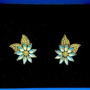 Heidi Daus “ Crystal Flower “ Earrings. Light Blue. Clip on